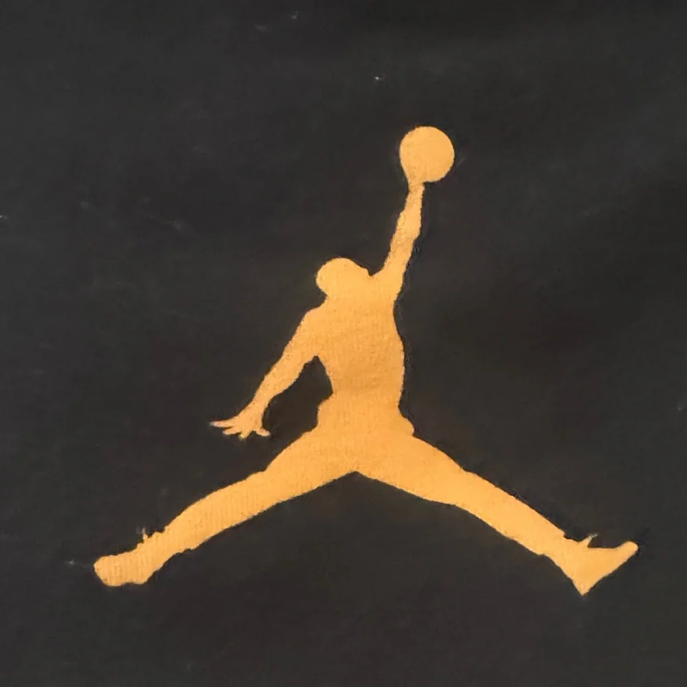 Jordan‎ Black Tee with Gold Accents